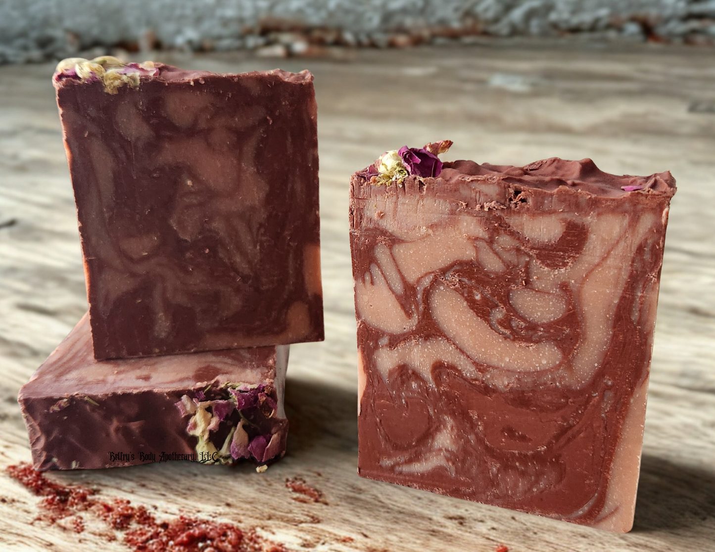 Protection collection - three red Moroccan and French pink clay soap bars with florals on top.
